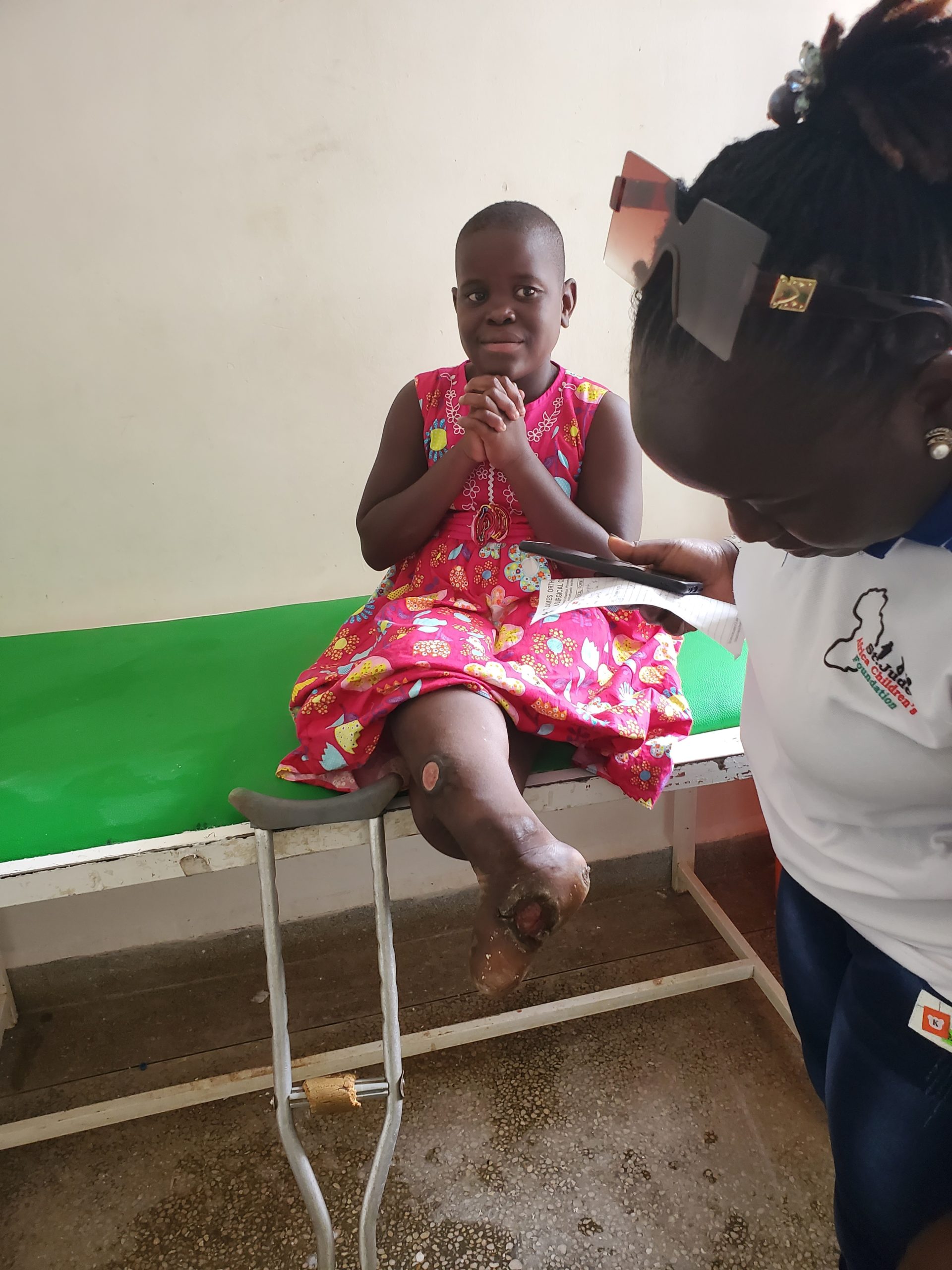 Mariam with caregivers during June 2023 care planning