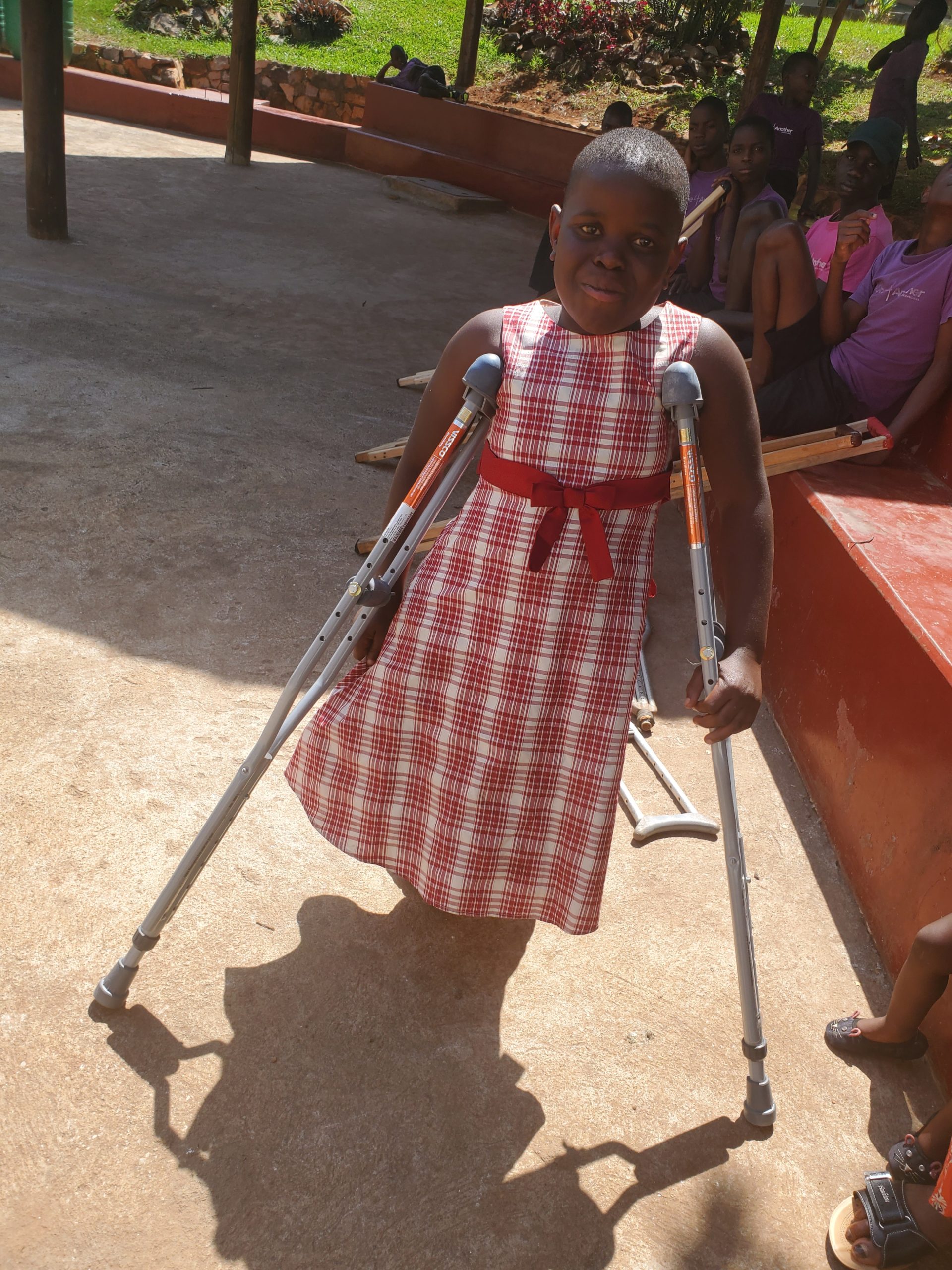 Mariam during a follow-up visit after receiving mobility support